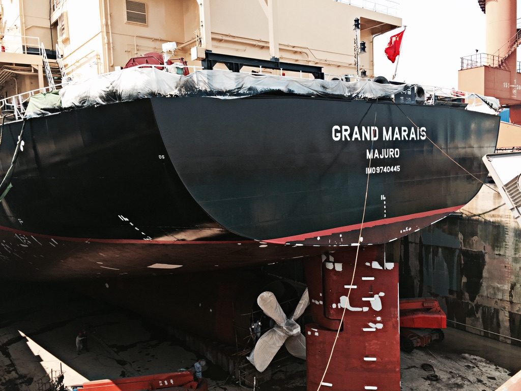 Stern of Grand Marais in dry dock with propeller and rudder visible